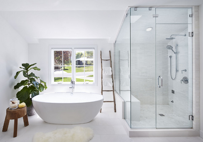 Bathroom. I love how uncomplicated and organic this entire space feels. The oval tub measures as 70.25" x 34.25" x 21.75". #bathroom #ovaltub #tubmeasurements Martha O'Hara Interiors