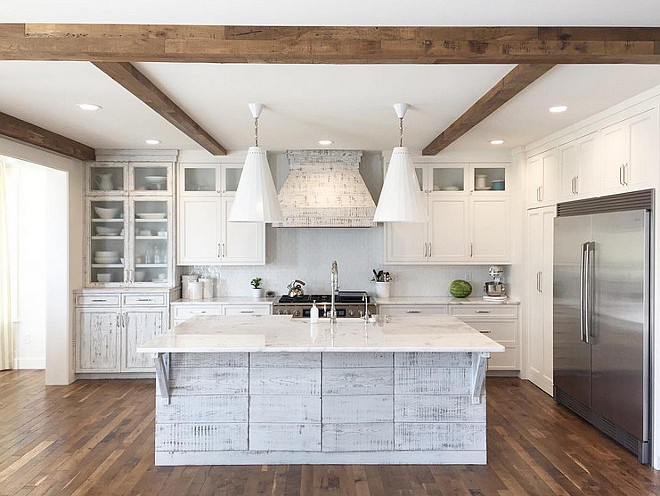 Distressed kitchen. Distressed white kitchen. Distressed white kitchen ideas. The floor is solid reclaimed oak in 3-4" planks. #distressedkitchen #distressedwhitekitchencabinet #distressedkitchen Four Chairs Design.