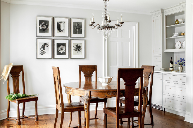 Farmhouse style dining room. The traditional dining room furniture adds warmth to the gray cabinetry. #diningroom #furniture #farmhouseinteriors Heidi Piron Design.