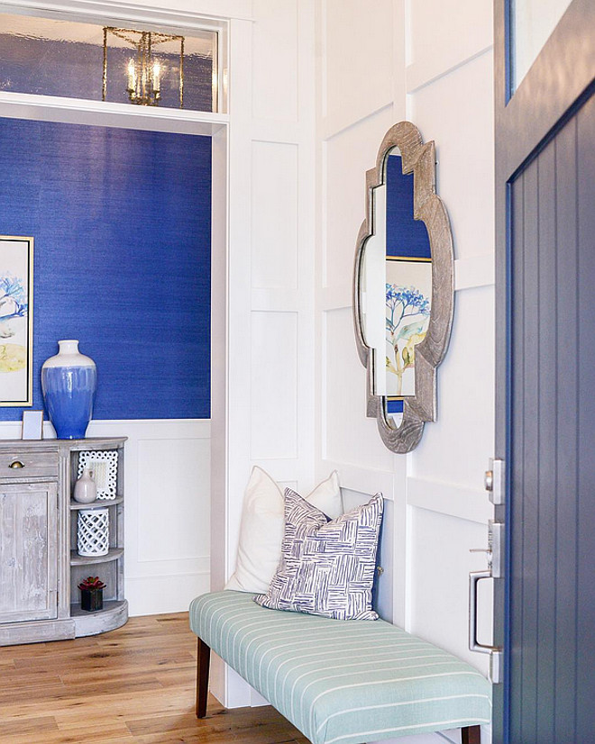 Foyer with Bench and reclaimed wood mirror. Foyer bench. Foyer mirror. #Foyer #Bench #mirror Four Chairs Design. Built by Millhaven Homes.