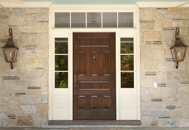 Wood Front Door. Real wood front door. Front Door: Base bid: Oak, stained. #door #frontdoor #wooddoor #woodFrontdoor #oakdoor T.S. Adams Studio. Interiors by Mary McWilliams from Mary Mac & Co.