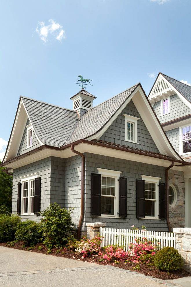 Garage windows with shutters. Garage windows with shutters, copper metal roof and copper gutters. #Garage #window #shutters #copperroof #coppergutter T.S. Adams Studio. Interiors by Mary McWilliams from Mary Mac & Co.