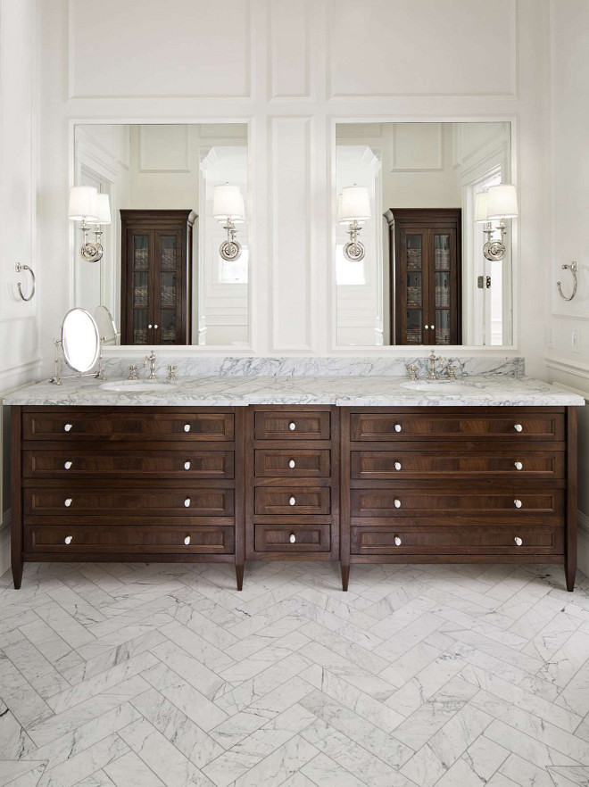 Herringbone marble tile. Bathroom with Herringbone marble tile. Herringbone marble tile with walnut cabinet in bathroom. Herringbone marble tile #Herringbonemarbletile #Herringbone #marbletile Fox Group Construction