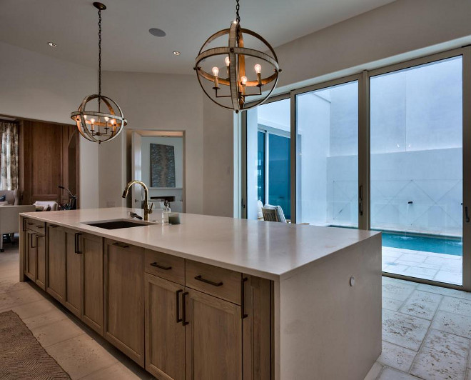 Kitchen Hardware. What type of hardware should be used on white oak kitchen cabinets. Cabinet Hardware: Provided by Finishes and Fixtures - Birmingham, Alabama. Finish is English Bronze. Scenic Sotheby's Realty. Interiors by Jan Ware Designs.