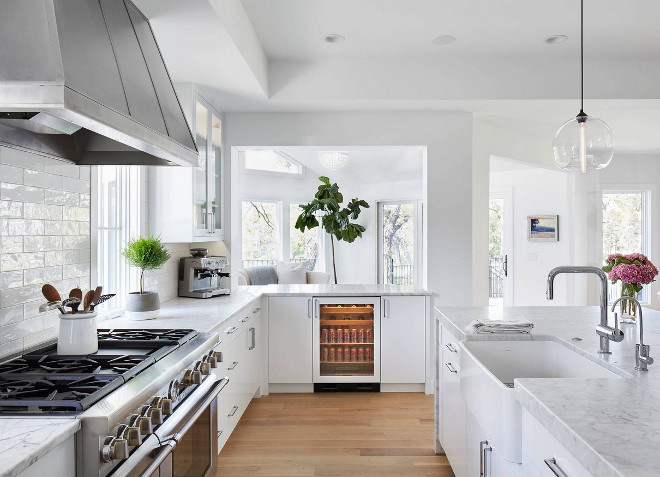 Kitchen perimeter and island countertop. Kitchen Countertop: Honed Bianco Gioia Extra Marble. Kitchen Backsplash: Walker Zanger Café-Milk 3” x 12” Tile in Brick Pattern. #Kitchen #countertop #backsplash Martha O'Hara Interiors