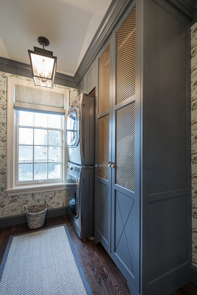 Laundry room with stacked washer dryer and storage cabinet beside it. Laundry room stacked washer dryer cabinet ideas. #Laundryroom #stackedwasherdryer #cabinet Northstar Builders, Inc.