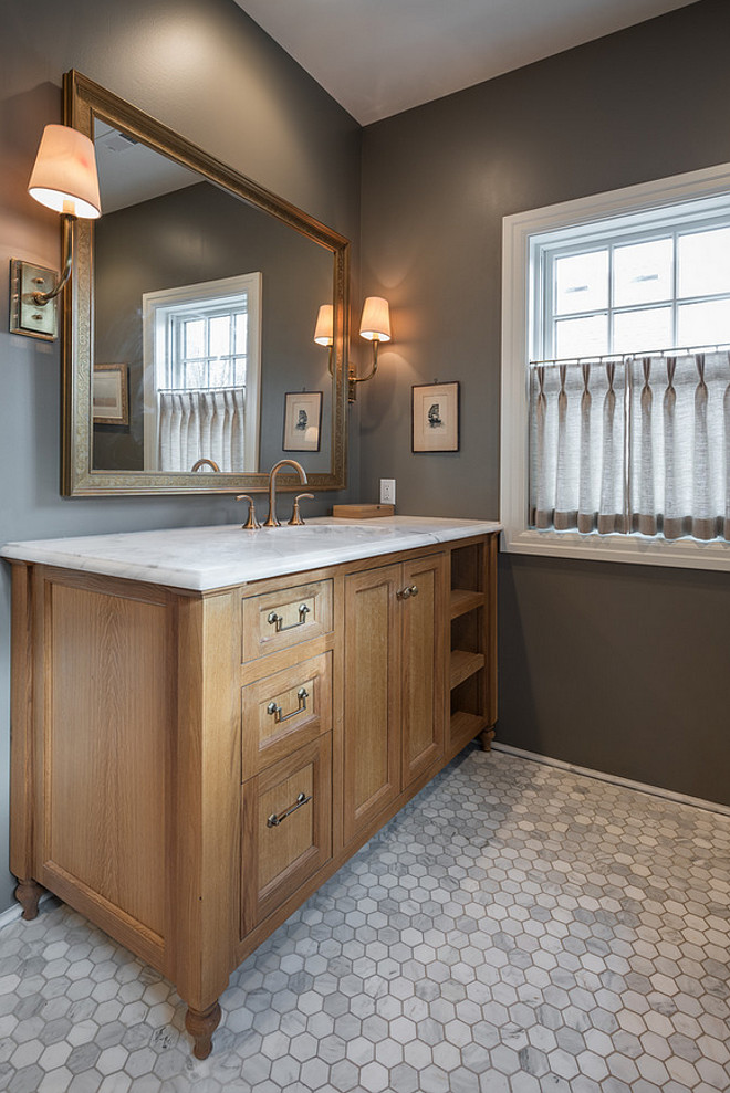 Limed oak cabinet. Bathroom with limed oak cabinets and octagon floor tile. #Limedoak #limedoakcabinet #limedoakwood #octagonfloortile Northstar Builders, Inc.