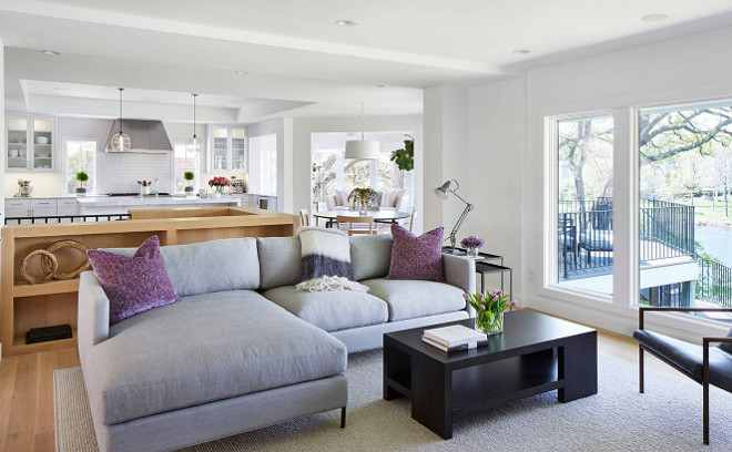 Living room sectional. The living room features a calming color palette and peaceful water view of the stream. Martha O'Hara Interiors