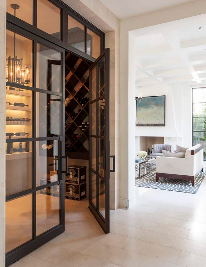 Main floor wine cellar with black stainless steel. Main floor wine cellar. #winecellar #mainfloorwinecellar Stocker Hoesterey Montenegro.