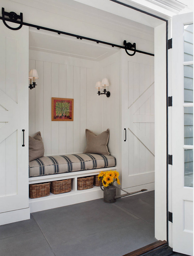 Mudroom with sliding barn doors. Farmhouse Mudroom Nook with slinding barn doors. Farmhouse Mudroom Nook with slinding barn doors - barn door hardware. #FarmhouseMudroom #mudroom #Nook #slindingbarndoors #barndoor Lori Henle Interiors