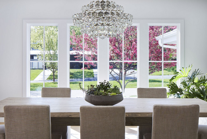 Neutral dining room. Scandinavian inspired dining room with neutral decor. Wall Paint Color: Benjamin Moore OC-152 Super White in Matte Finish. #Neutral #diningroom #Scandinavianinteirors Martha O'Hara Interiors