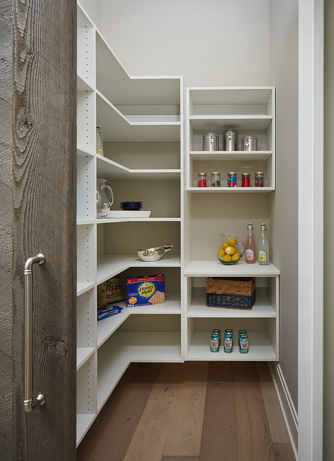 Pantry with reclaimed wood door. Pantry with reclaimed barn door. Pantry features a reclaimed wood barn door #Pantry #reclaimedwood #barndoor #wood #door