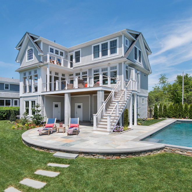 Pool deck and patio. Backyard with pool, decks and railing. Elevated deck with stainless steel railings, stone pool patio. #Patio #deck #stonepatio #patio