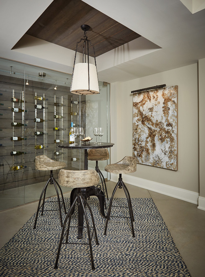 Reclaimed wood ceiling inset. Reclaimed wood ceiling inset ideas. The wine area features a glass wine storage wall with Ghost Wood paneling. The ceiling inset is also Ghost Wood. Basement features Reclaimed wood ceiling inset. #Reclaimedwood #ceiling #inset #ceilinginset