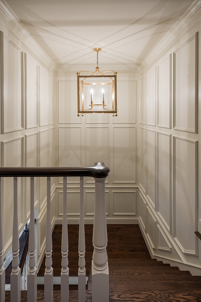 Stairway lighting. Stairway featuring paneled walls and lantern pendant lighting. #stairway #lighting #paneledwalls Northstar Builders, Inc.