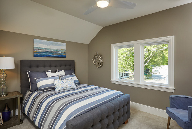 Teen Bedroom with grey walls, grey bed and navy and grey bedding. Paint color is Benjamin Moore Himalayan Trek Mike Schaap Builders