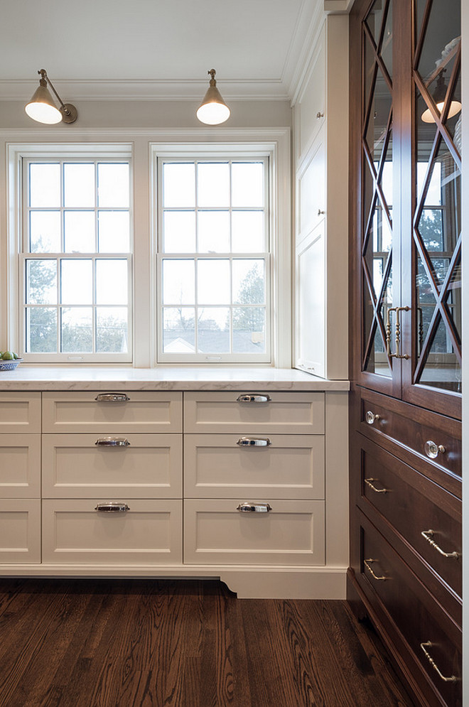 Two tone kitchen. Neutral tow tone kitchens. Two tone kitchen with white cabinets and walnut stained cabinets. #Twotonedkitchen #neutraltwotonedkitchen Northstar Builders, Inc.