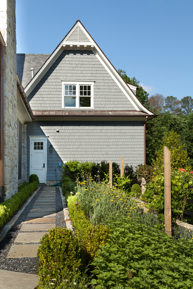 Vegetable Garden. A door on the side of the house opens to an expansive vegetable garden. #vegetablegarden T.S. Adams Studio. Interiors by Mary McWilliams from Mary Mac & Co.