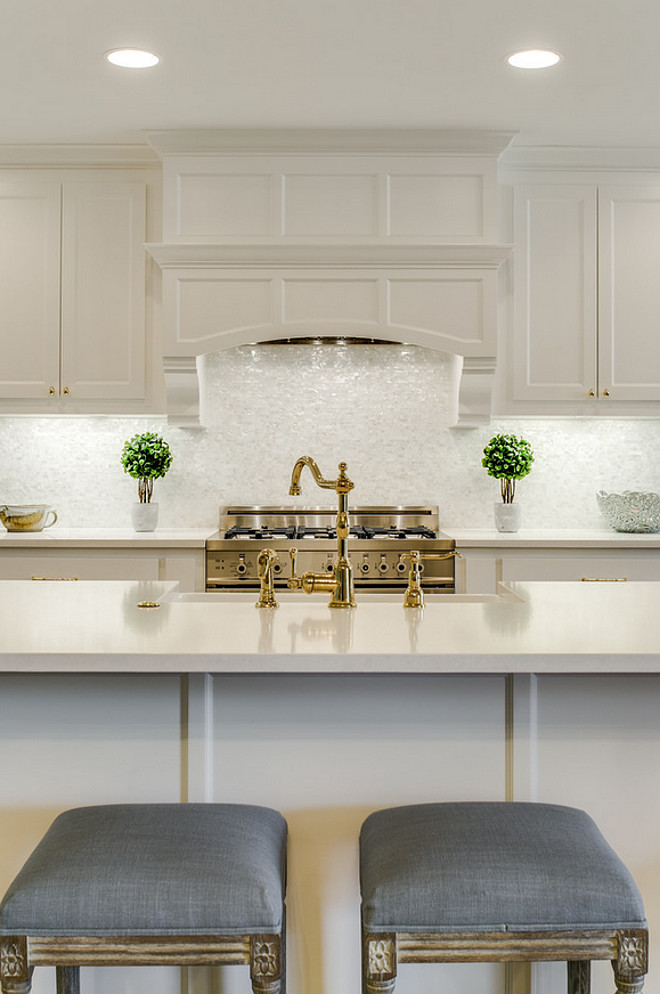 White kitchen with brass faucet and grey linen counterstool. White kitchen with brass faucet and grey linen counterstool ideas #Whitekitchen #brassfaucet #greylinencounterstool Redo