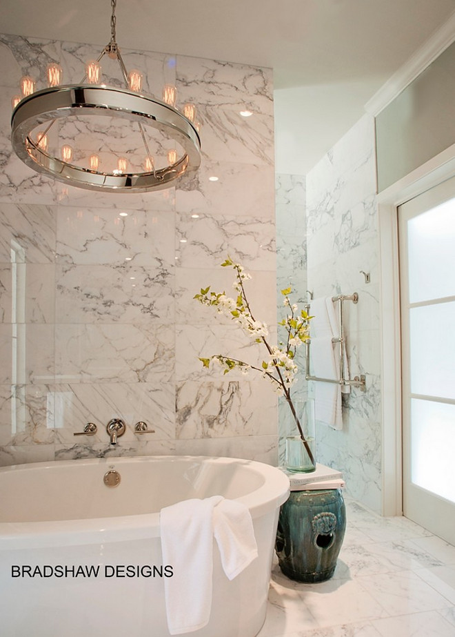 Bathroom lighting. Bathroom with lighting above tub. Bathroom lighting. Lighting above tub is Ralph Lauren Roark Modular Ring Chandelier in Polished Nickel. #RalphLauren #RoarkModular #RingChandelier #PolishedNickel