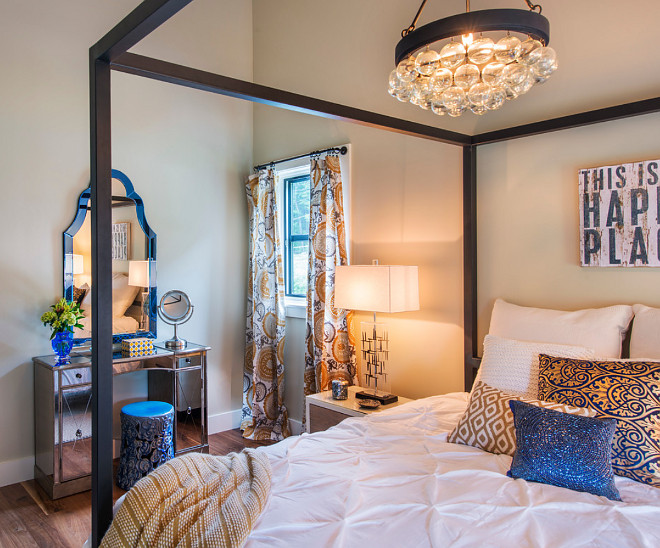 Bedroom lighting. Four poster bed lighting. Bedroom lighting. Chandelier is from Currey & Co. #Bedroom #lighting Caldwell & Johnson Custom Builders & Remodelers