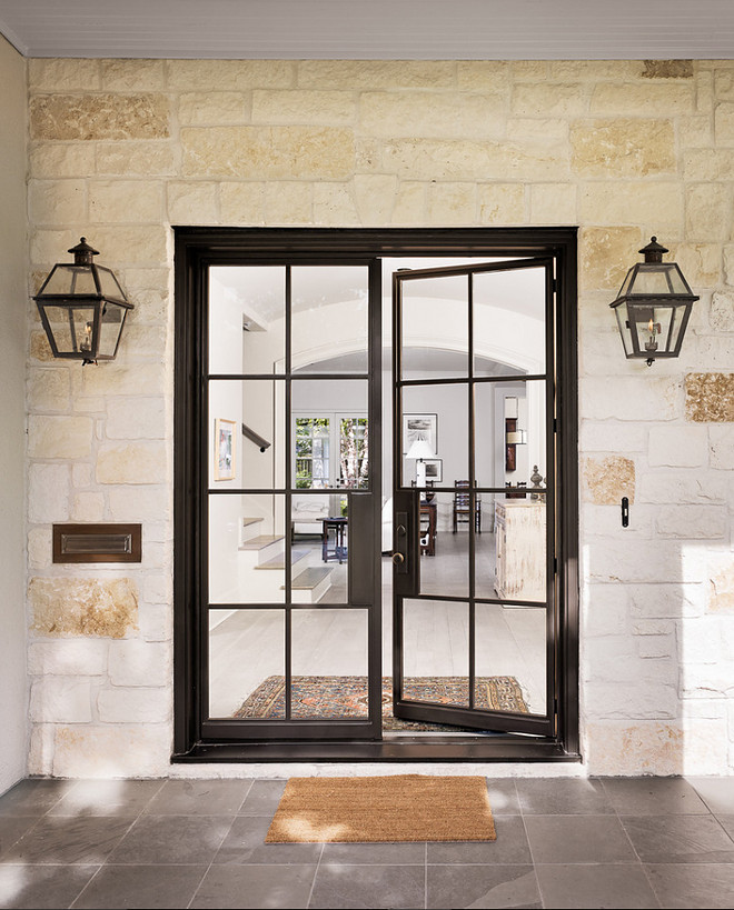 Black Steel Front Door. Front entry with black steel door, stone walls and Bluestone floor tile. Black Steel Front Door. Steel Front Door. Black Steel #BlackSteelDoor #Frontdoor #BlackSteelDoor #SteelDoor