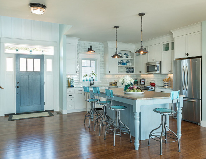 Coastal kitchen with blue gray kitchen island, off-white cabinets and turquoise barstools. Coastal cottage kitchen with blue gray kitchen island, off-white cabinets and turquoise barstools. #Coastalkitchen bluegray #kitchenisland #offwhitecabinets #turquoisebarstools