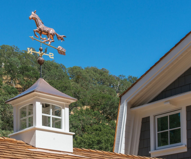 Cupola and weather vane. The cupola on the roof is made out of copper. Shingle home with Cupola and weather vane. #Cupola #weathervane The ADDRESS Company
