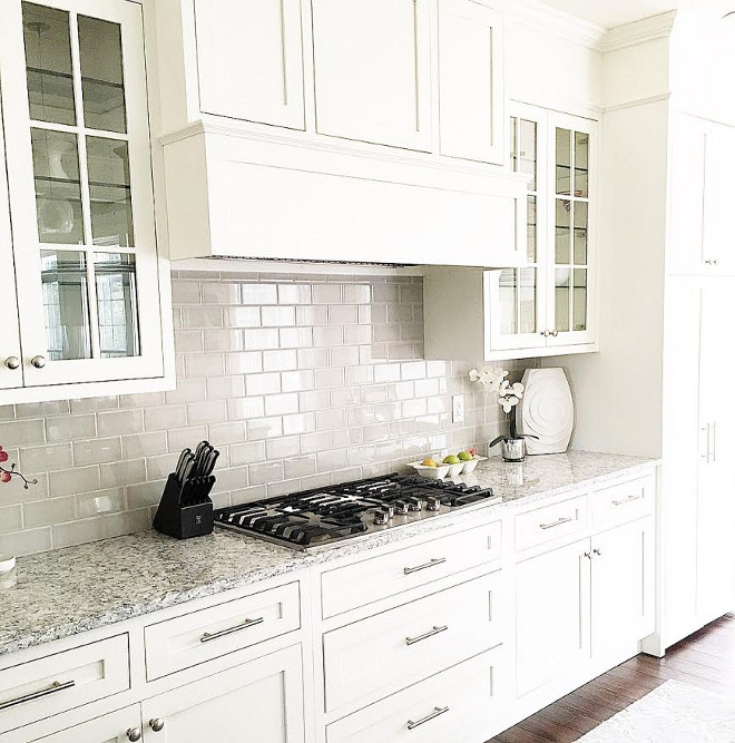 Grey backsplash tile. Grey backsplash tile in creamy white kitchen. Grey backsplash tile is Casabella Tile H-Line Collection color Pumice. #Greybacksplashtile