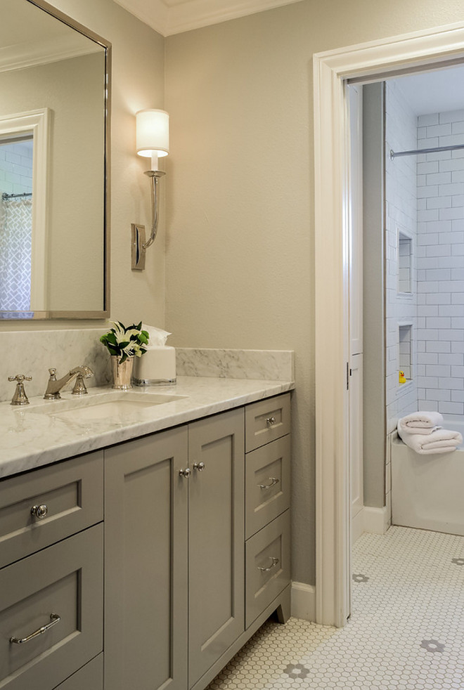 Grey bathroom. Grey bathroom with pale grey walls and grey cabinets. Grey bathroom paint color. Grey bathroom with pale grey walls and grey cabinets #Greybathroom #bathroom #palegrey #greywalls #greycabinet #cabinets