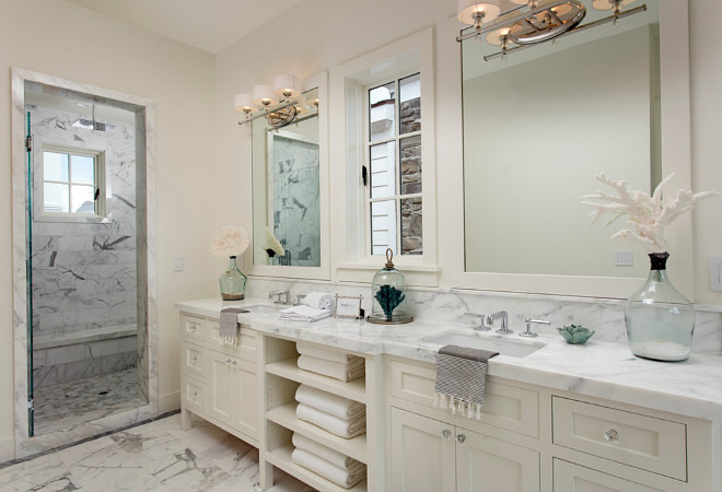 Ivory white bathroom with marble countertop and marble floor tiles. Ivory white bathroom with marble countertop and marble floor tile. #Ivorywhitebathroom #Ivorywhite #bathroom #marble #countertop #marbletile #floortiles Blackband Design