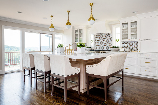 Kitchen island barstools and bench stool. Kitchen island features three barstools and a bench stool on the side of island. #barstools #bench #island #kitchenisland Finish Point Trim & Millwork, Inc