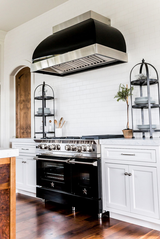 Kitchen with counter to ceiling backsplash tile, 5 star range and black hood. Kitchen with counter to ceiling backsplash tile, 5 star range and black hood. #Kitchen #countertoceilingbacksplashtile #backsplashtile #5starrange #blackhood Hyrum McKay Bates Design, Inc.