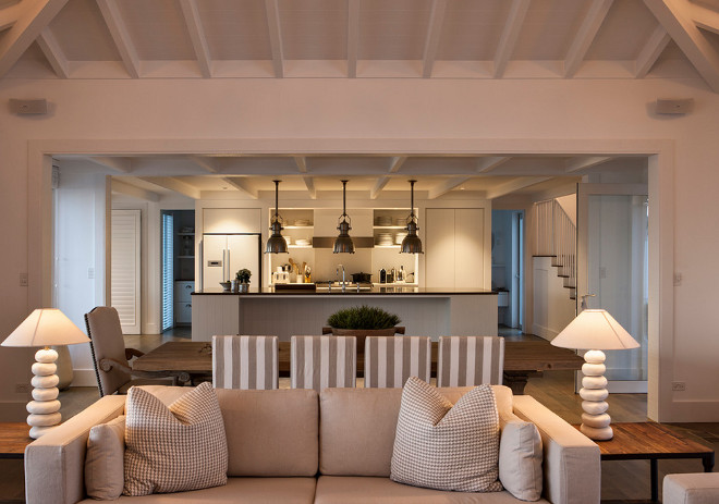 Neutral family room opens to dining room to kitchen. Christian Anderson Architects