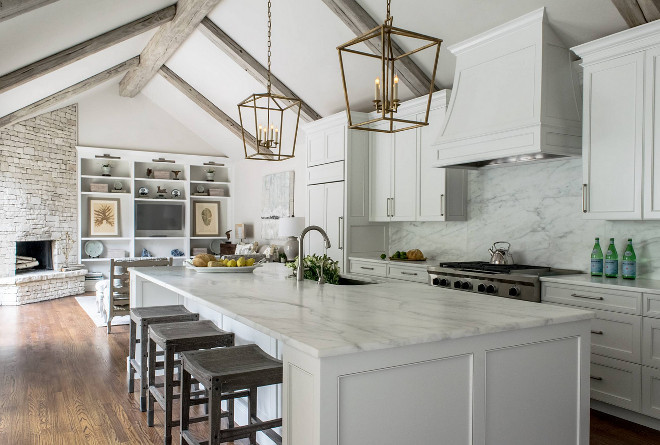 Remodeled White Kitchen with Vaulted Ceiling Beams - Home Bunch Interior Design Ideas