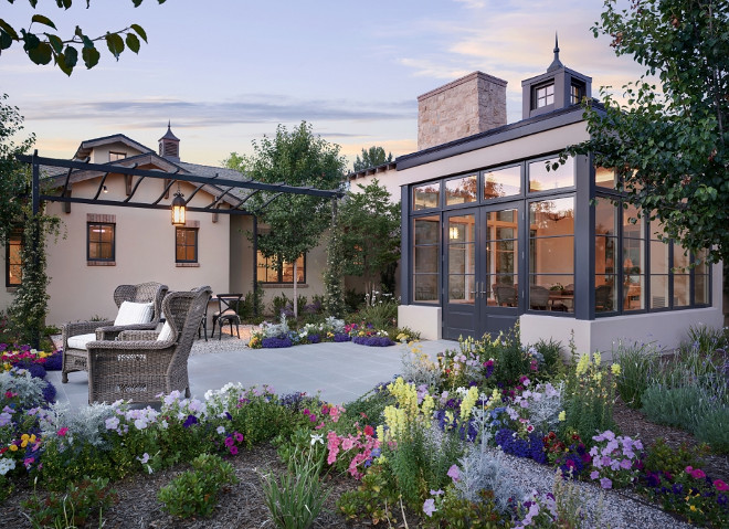 Patio with pergola. Patio just off the sunroom with bluestone flooring and pergola. #Patio #Pergola #sunroom #bluestone Candelaria Design Associates