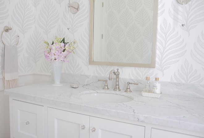 Countertop is honed Statuario marble. Powder room styling. Powder room styling. Powder room styling decor. Powder room styling ideas. Powder room styling like a pro. #Powderroomstyling #Powderroom jshomedesign