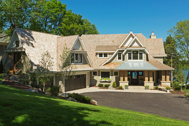 Shingle Lake Home. Shingle Lake Home Exterior. Shingle Lake Home exterior features cedar shingle roof, shingle siding and Indiana Limestone. #Shinglehome #LakeHome #homeexterior #cedarshingle #roof #shinglesiding #IndianaLimestone