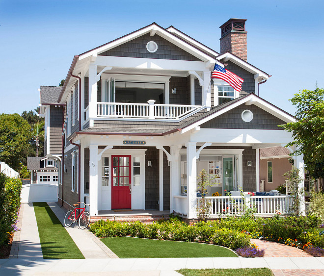 Shingle cottage with red front door. Red door paint color is " Pratt and Lambert Apple Candy". Shingle cottage cedar shingles. Grey cedar shingles cottage with red front door. #Shingle #cedarshingle #cottage #reddoor #redfrontdoor #frontdoor #Paintcolor #Reddoorpaintcolor #PrattandLambertAppleCandy Flagg Coastal Homes