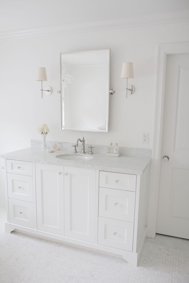 Simply White OC-117 by Benjamin Moore. White paint color by Benjamin Moore Simply White OC-117. Wall and cabinet paint color is Benjamin Moore Simply White OC-117. Benjamin Moore. Simply White OC-117 by Benjamin Moore #SimplyWhiteOC117byBenjaminMoore