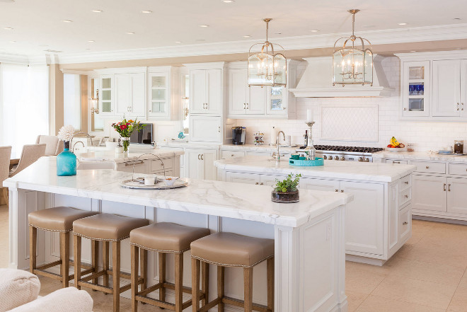 White kitchen with beige walls. Beautiful White kitchen with beige walls and two islands. White kitchen with beige walls. #Whitekitchen #beigewalls Monarch Development and Design