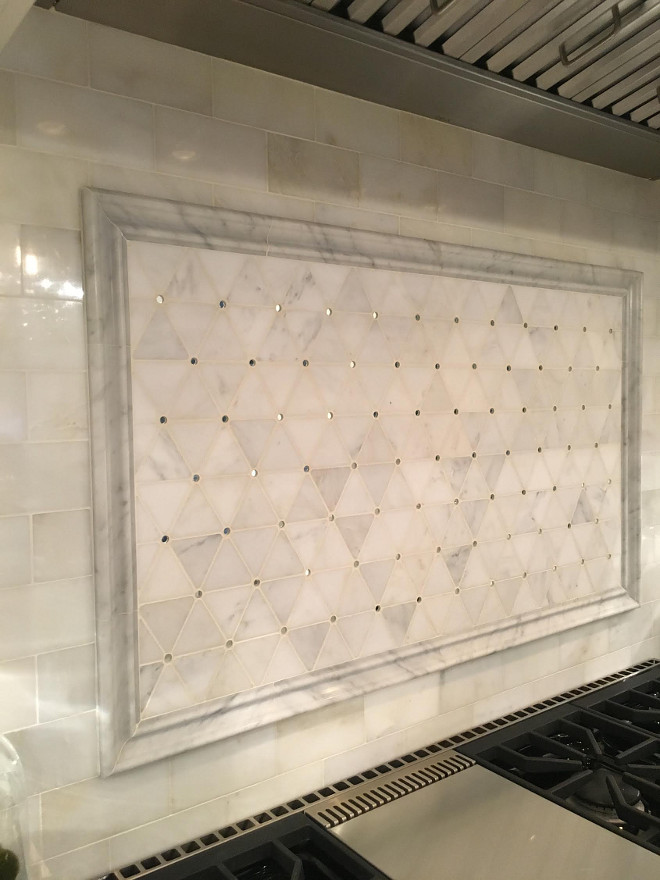 Backsplash above range. Above range backsplah. The backsplash is framed with Honed Carrara Marble Border. #backsplash #HonedCarraraMarble #backsplashBorder Beautiful Homes of Instagram Sumhouse_Sumwear