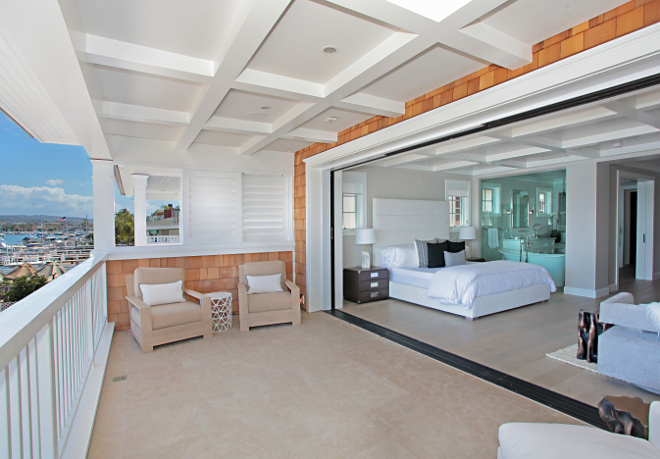 Balboa Beach House Balboa Beach House Bedroom feature La Cantina sliding doors. #Balboa #BeachHouse Winkle Custom Homes. Melissa Morgan Design. Ryan Garvin Photography