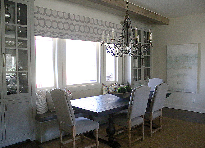 "We did a built in bench for seating underneath the window. We covered that with a durable faux charcoal leather so it would easily wipe up well with kid spills. Love the 2 built ins as well that display various decor pieces". banquette-cabinet Home Bunch's Beautiful Homes of Instagram curlsandcashmere