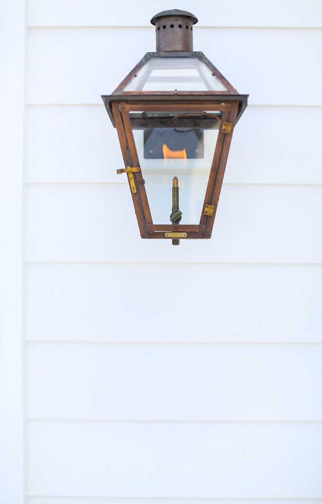 Bevolo Gas Lantern on White Siding. Exterior lights are Bevelo exterior gas lanterns. Exterior lights are Bevelo exterior gas lanterns. #Exteriorlights #Bevelo #exteriorgaslantern #gaslanterns #Exteriorlight Winkle Custom Homes. Melissa Morgan Design. Ryan Garvin Photography