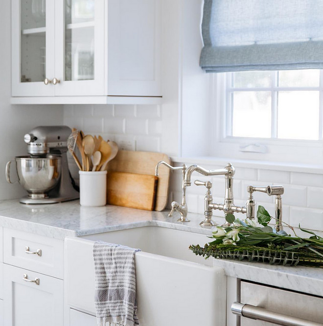 Carrara, Subway Tile and farmhouse sink. This combo never fails in a kitchen. #kitchen #carrara #subwaytile #farmhousesink Rita Chan Interiors