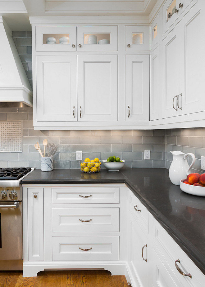 Countertop and Backsplash Combo Ideas. The perimeter countertops used in this kitchen were Caesarstone and the color was Raven. The backsplash tile used in this project was Pratt and Larson's W87 watercolor field tile. Countertop and Backsplash Combo. #Countertop #Backsplash Robert Frank Interiors. Clark Dugger Photography