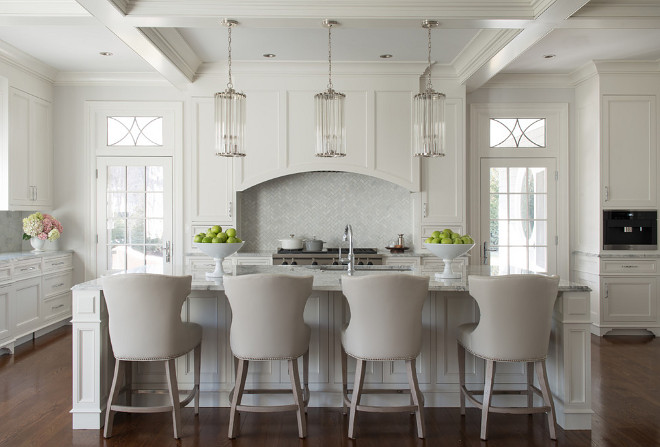 Cream white kitchen. Gorgeous cream white kitchen with coffered ceiling, dark hardwood floor and large cream white kitchen island. #creamwhitekitchen #kitchen #creamwhite #kitchen Pecora Brothers, Inc.