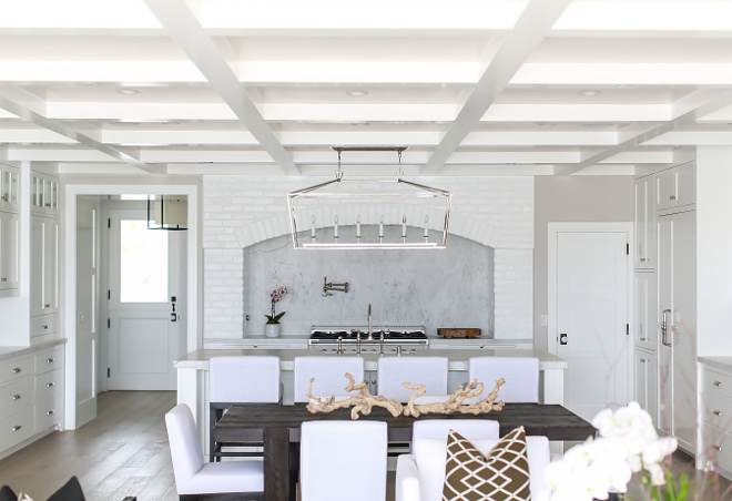 Backsplash. Solid marble backsplash with a raised border and inset field. Marble veining is continuous from raised border flowing into the inset field. All from same slab. #kitchen #slab #backsplash Winkle Custom Homes. Melissa Morgan Design. Ryan Garvin Photography