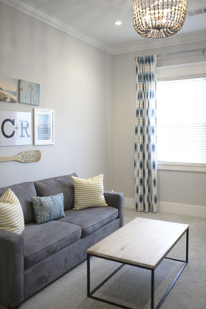 This space is used as a playroom/video game room. Lighting is RH Teen Taren Large Pendant. Gallery Wall Art is from Etsy shop shawnstpeter. #playroom #videogameroom Eye for the Pretty